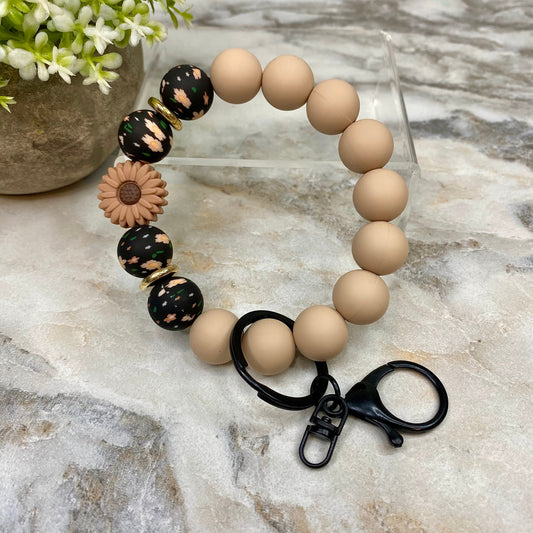 Silicone Bracelet Keychain - Dark Tan Sunflower Black Floral bracelet keychain by Arimel by Emily