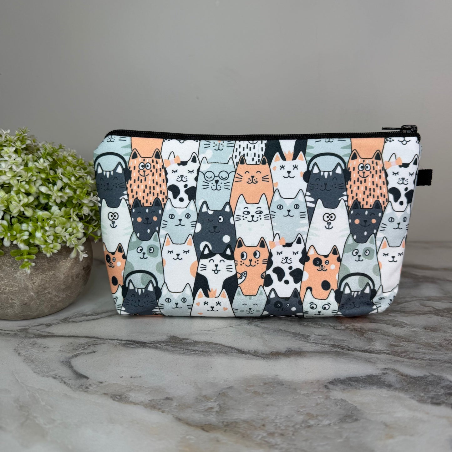 Cats In A Row Blue zipper pouch by Arimel by Emily