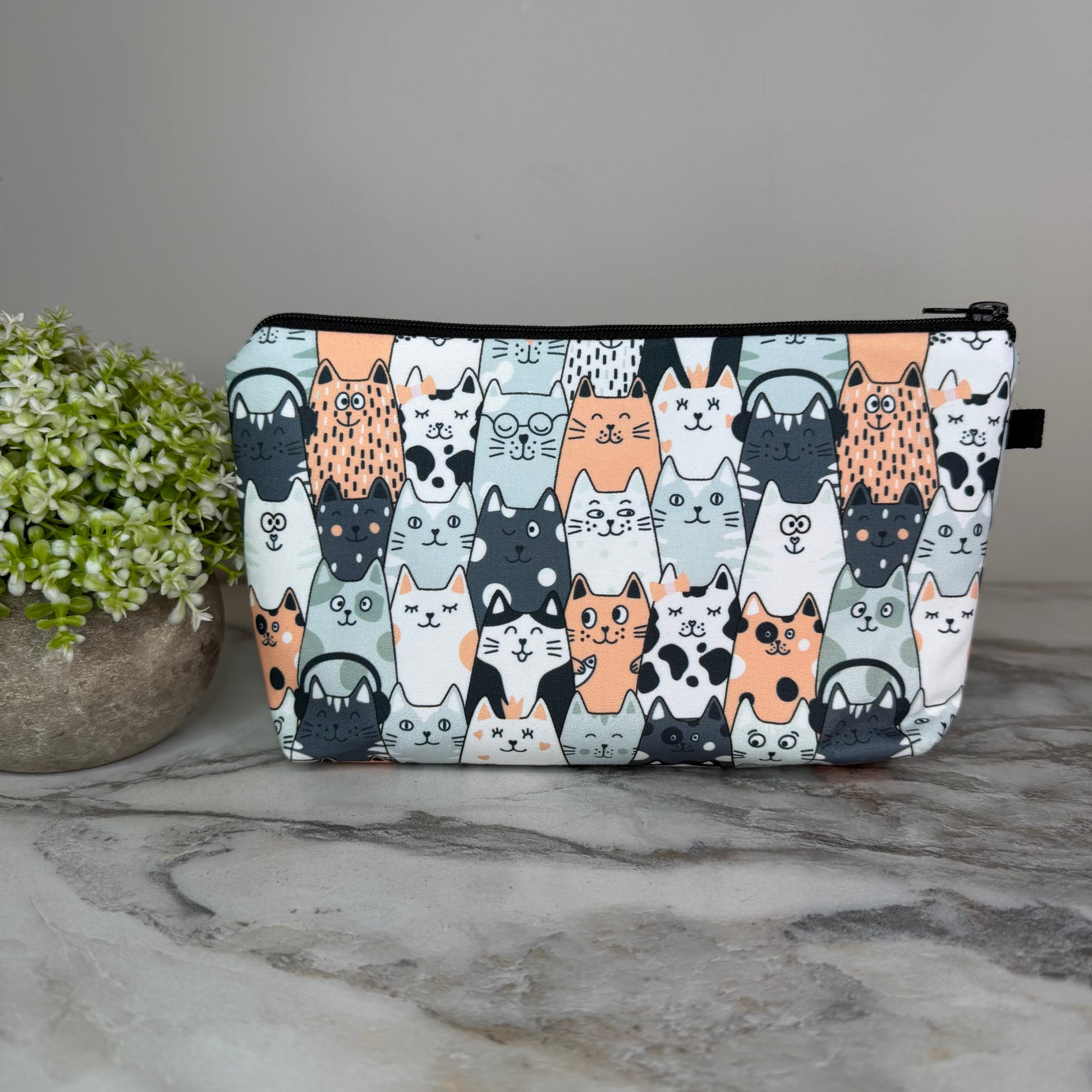 Cats In A Row Blue zipper pouch by Arimel by Emily