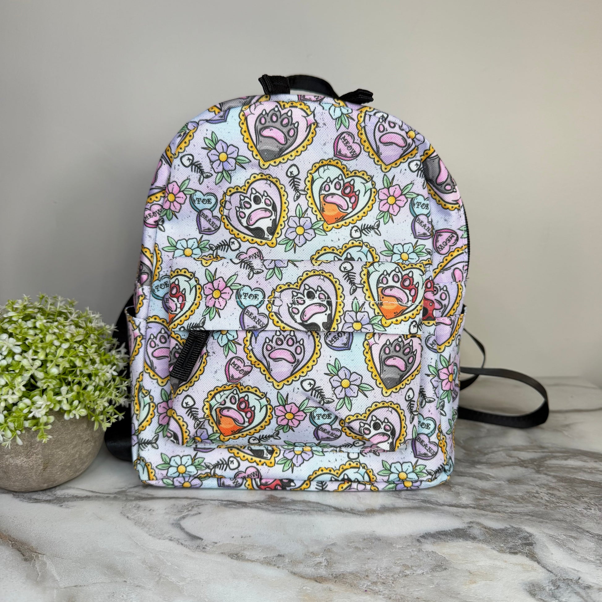 Cat Paw Meow on Pastel mini backpack by Arimel by Emily