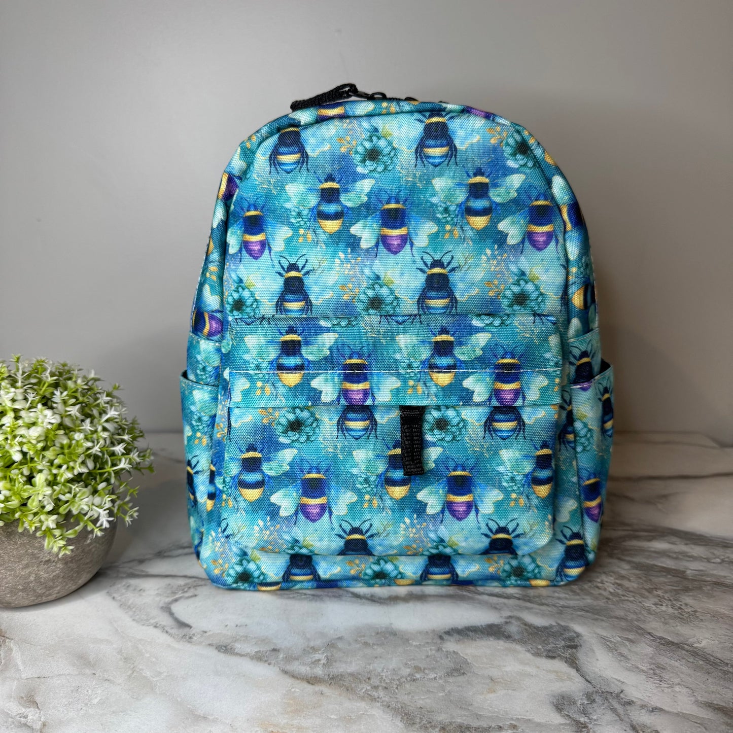 Teal Floral Bee mini backpack by Arimel by Emily